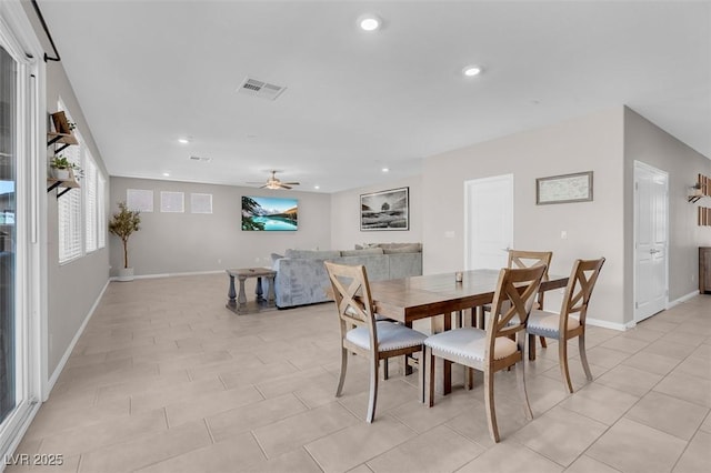 dining area featuring light tile patterned flooring and ceiling fan