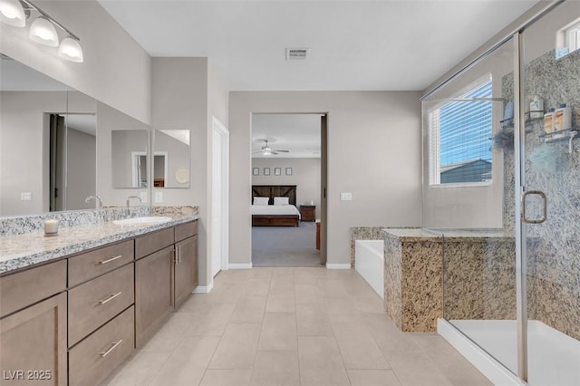 bathroom with vanity, ceiling fan, and separate shower and tub