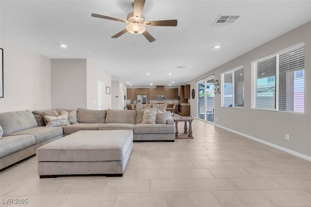 living room with ceiling fan