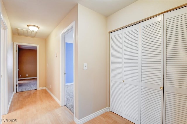 hall featuring light hardwood / wood-style flooring