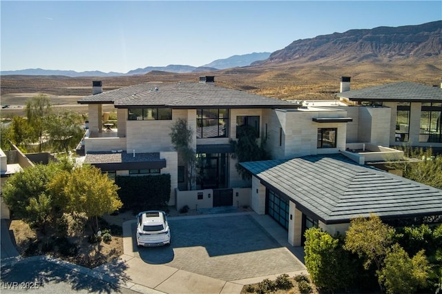 exterior space featuring a mountain view