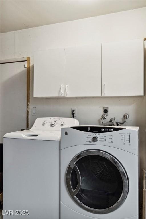 laundry area featuring cabinets and independent washer and dryer