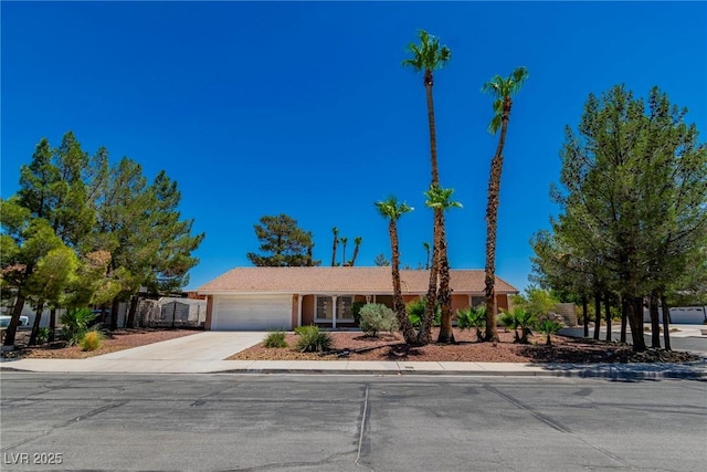 single story home with a garage