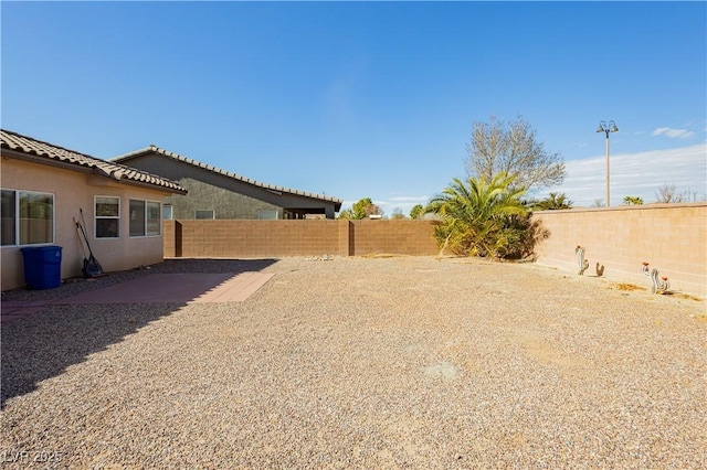 view of yard featuring a fenced backyard