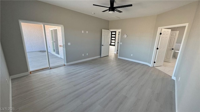 unfurnished bedroom with access to outside, connected bathroom, ceiling fan, light wood-type flooring, and baseboards