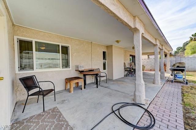 view of patio with a grill