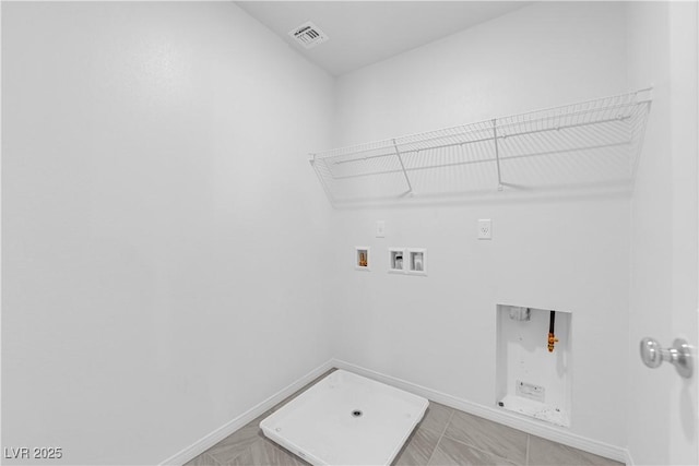 washroom with washer hookup, hookup for a gas dryer, and electric dryer hookup