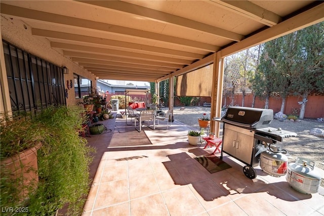 view of patio featuring a grill