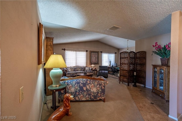 living room featuring light carpet, vaulted ceiling, and a textured ceiling