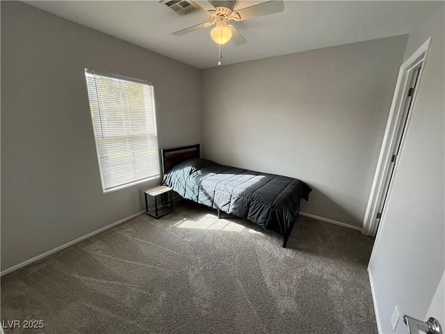 bedroom featuring ceiling fan and carpet flooring