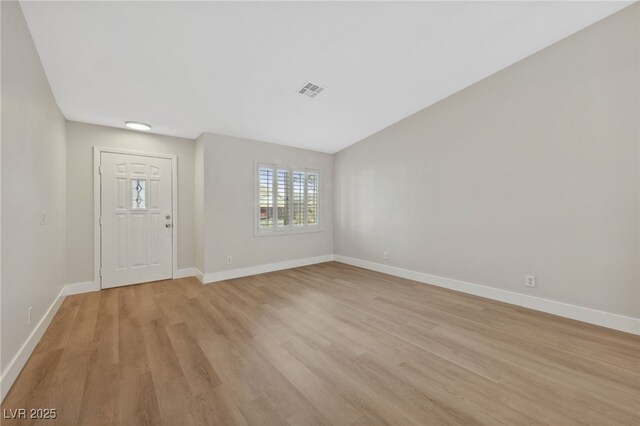 foyer with light wood-type flooring