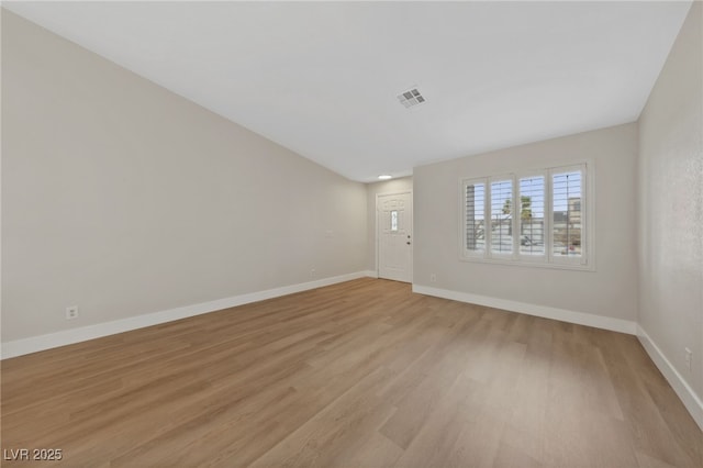 empty room featuring light hardwood / wood-style flooring