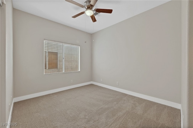 empty room with ceiling fan and carpet flooring