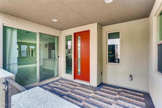 doorway to property featuring sink