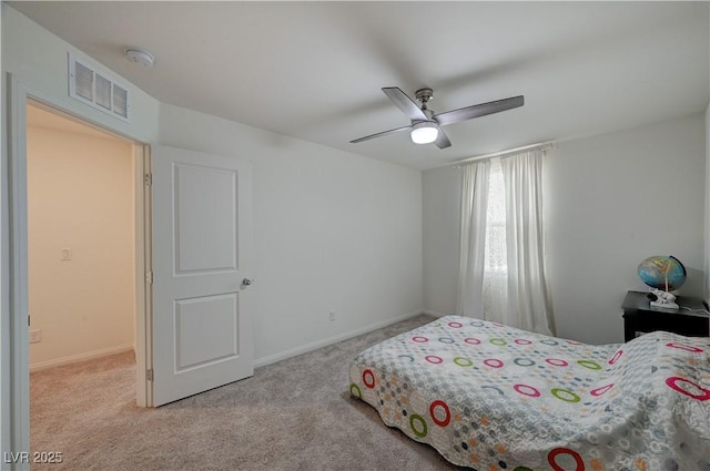 bedroom with light colored carpet and ceiling fan