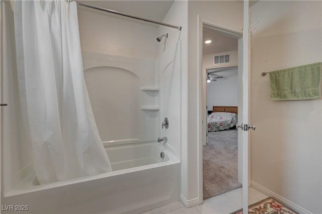 bathroom with tile patterned flooring and shower / tub combo with curtain