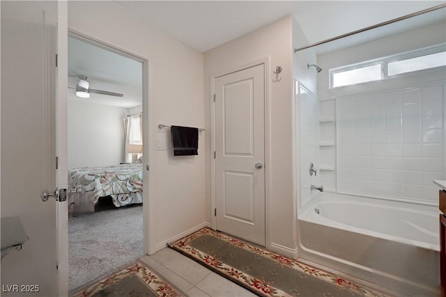 bathroom with vanity, bathtub / shower combination, and tile patterned flooring