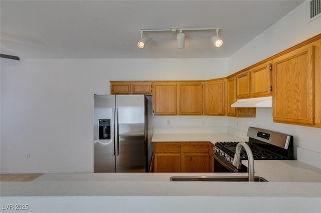 kitchen featuring appliances with stainless steel finishes and sink