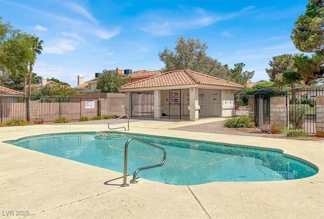 view of swimming pool featuring a gazebo and a patio area