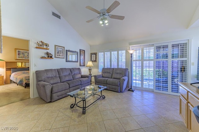 living room featuring light tile patterned floors, ceiling fan, high vaulted ceiling, and visible vents