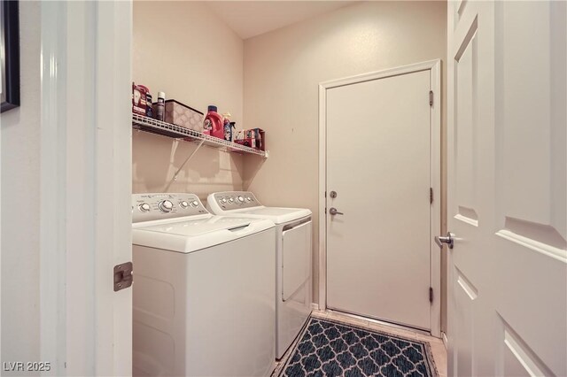 laundry room with washer and clothes dryer