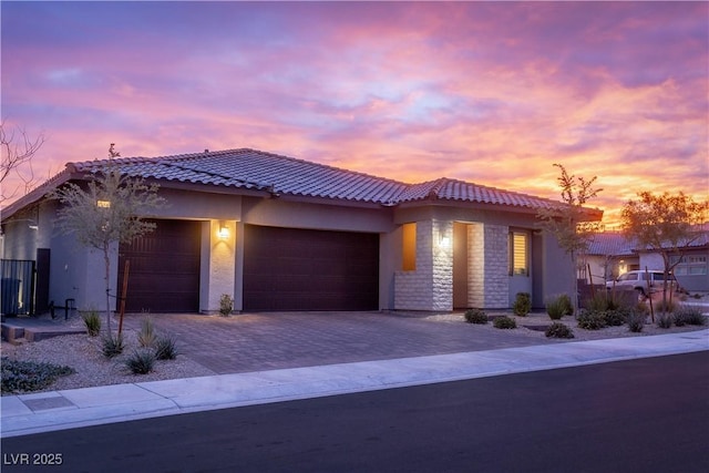 view of front of property with a garage