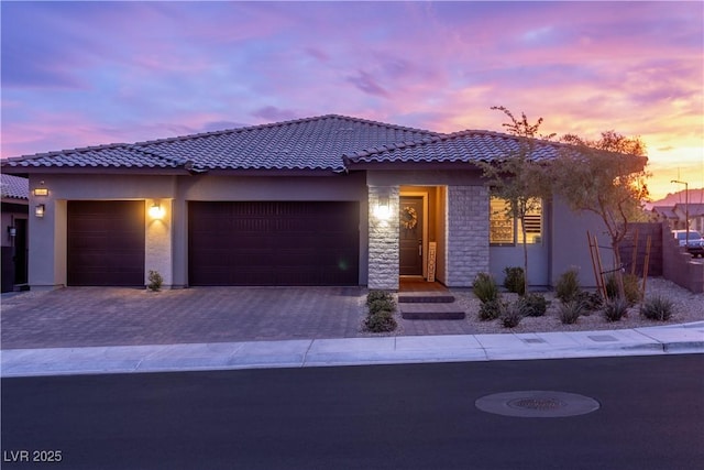 view of front of property featuring a garage