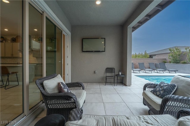 view of patio / terrace with outdoor lounge area and a fenced in pool