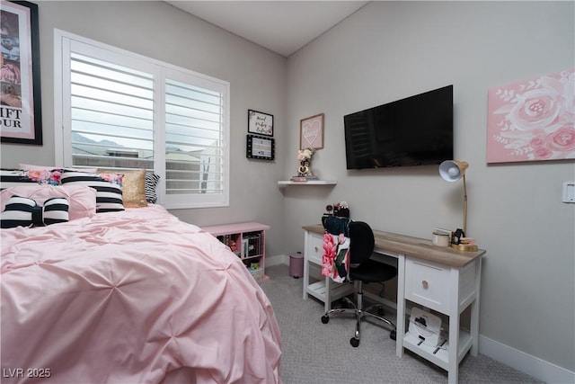 bedroom featuring light carpet