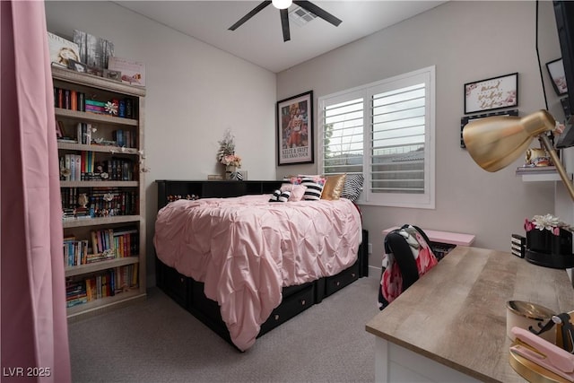 bedroom with ceiling fan and carpet floors