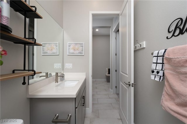 bathroom featuring vanity and tile patterned flooring