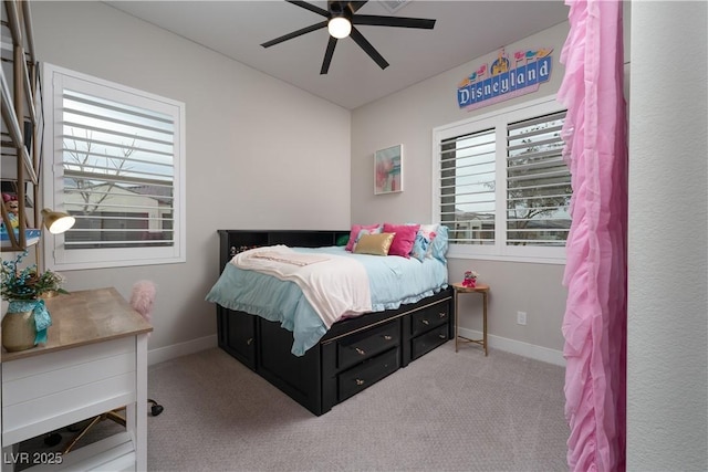 bedroom with light colored carpet and ceiling fan