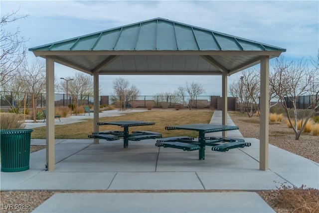 view of property's community with a gazebo and a lawn