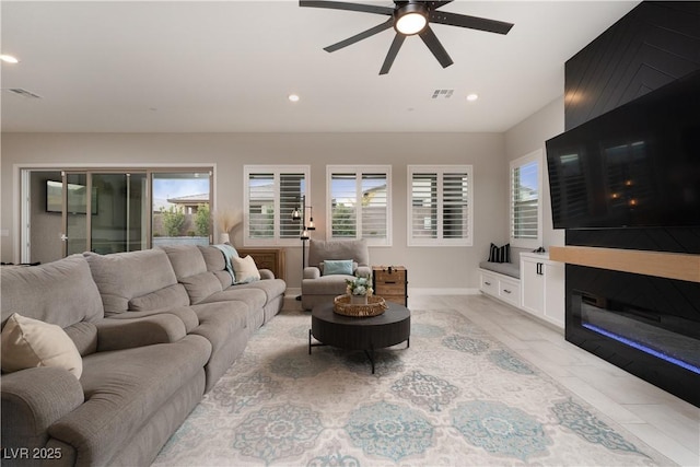 living room featuring ceiling fan