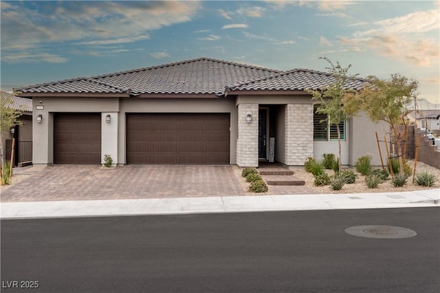 view of front of property with a garage