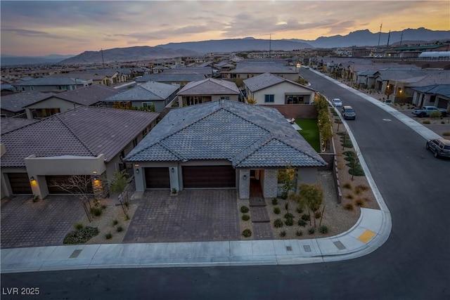 aerial view at dusk with a mountain view