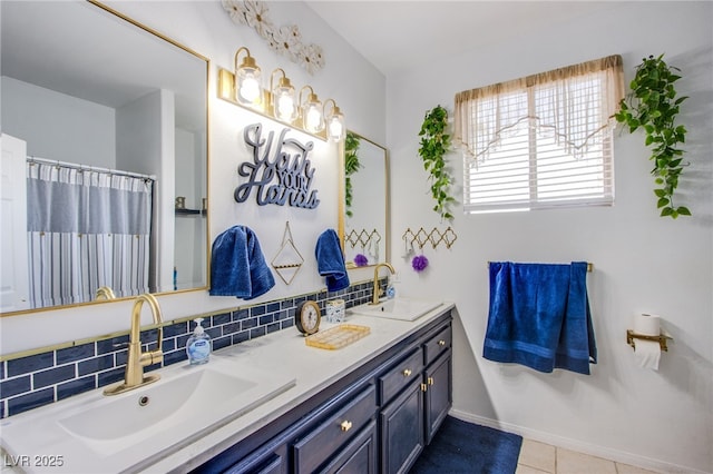 bathroom featuring tile patterned flooring, vanity, and backsplash