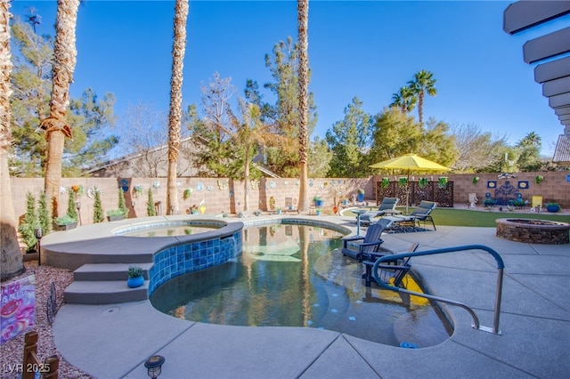 view of pool featuring an in ground hot tub