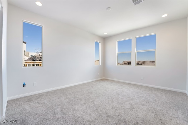 empty room featuring carpet floors