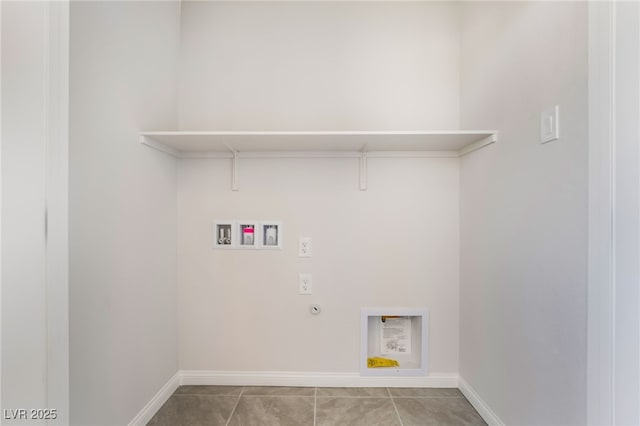 laundry area featuring tile patterned flooring, hookup for a washing machine, and gas dryer hookup