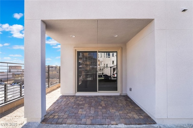 doorway to property featuring a balcony