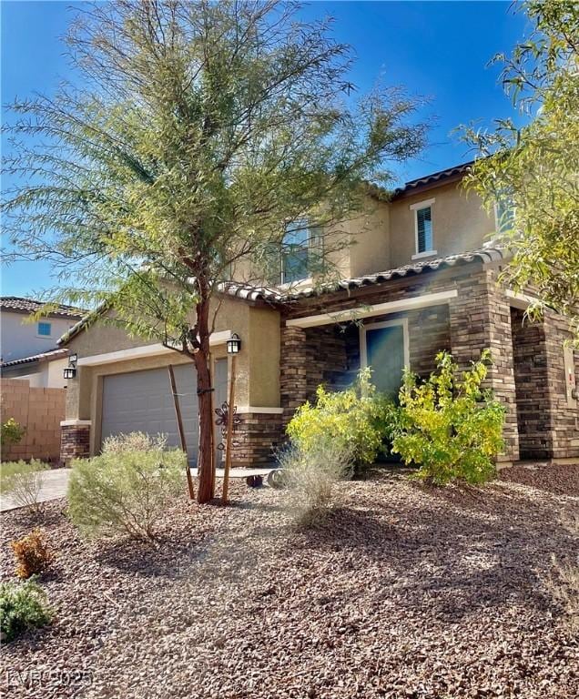 view of front of house with a garage