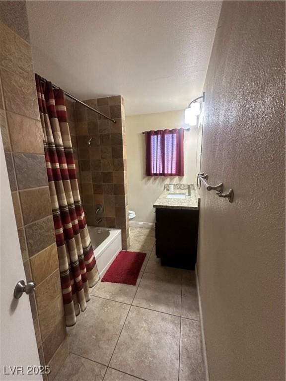 full bathroom featuring toilet, tile patterned flooring, vanity, and shower / bathtub combination with curtain