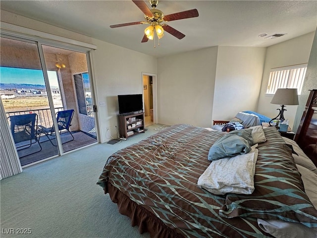 carpeted bedroom with access to outside and ceiling fan