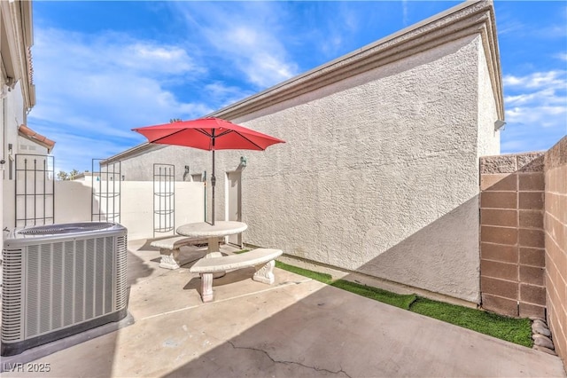 view of patio featuring central AC