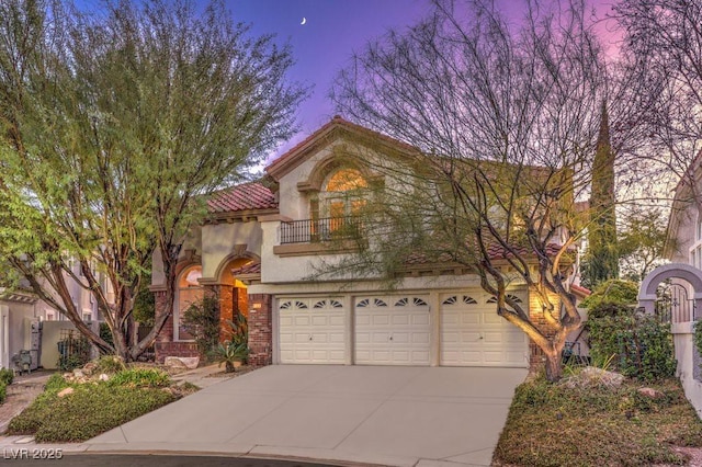 view of front of property with a garage