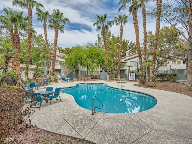 3055 Key Largo Dr Unit 203, Las Vegas, NV 89120 - community pool featuring a patio