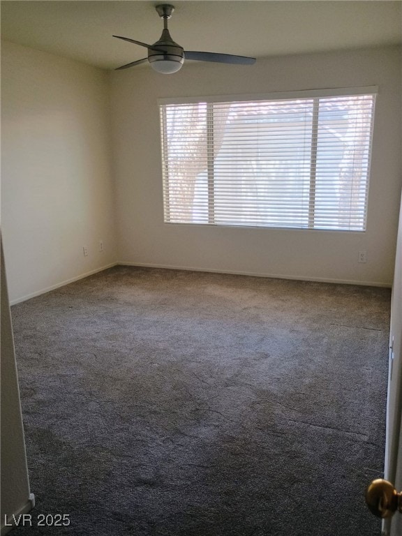 3055 Key Largo Dr Unit 203, Las Vegas, NV 89120 - carpeted spare room with plenty of natural light, a ceiling fan, and baseboards