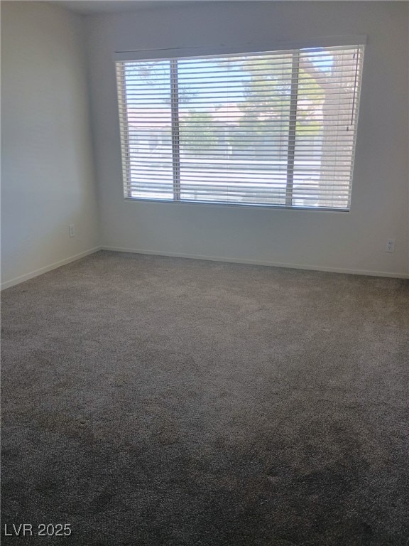 3055 Key Largo Dr Unit 203, Las Vegas, NV 89120 - carpeted empty room with baseboards