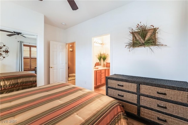 bedroom featuring ceiling fan and ensuite bathroom